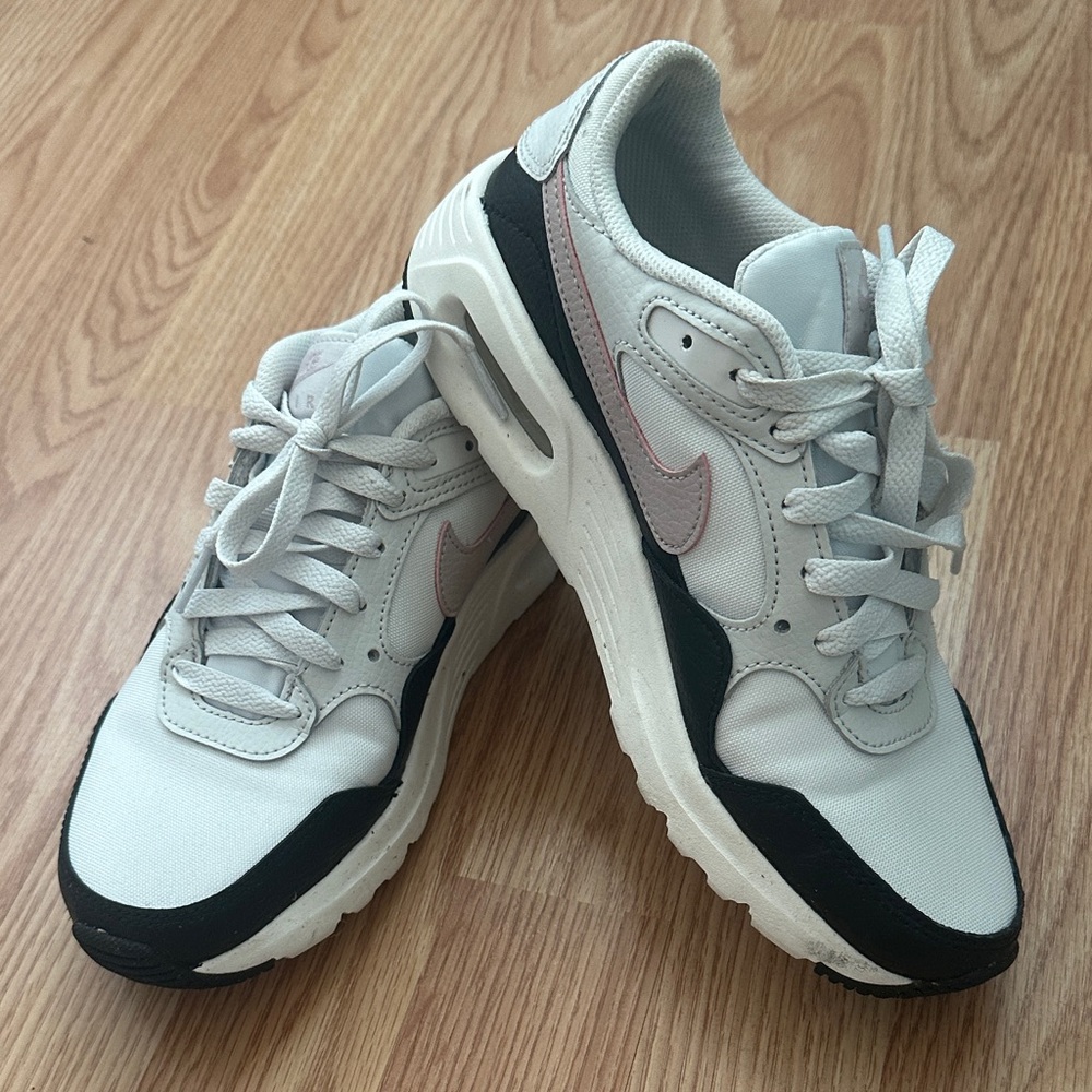 Nike Women's White and Black Sneakers with Pink Accents